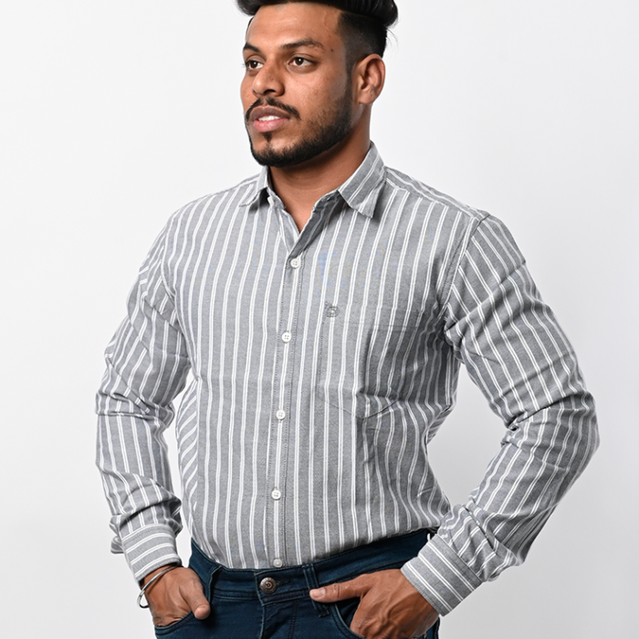 a man with his hands in his pockets