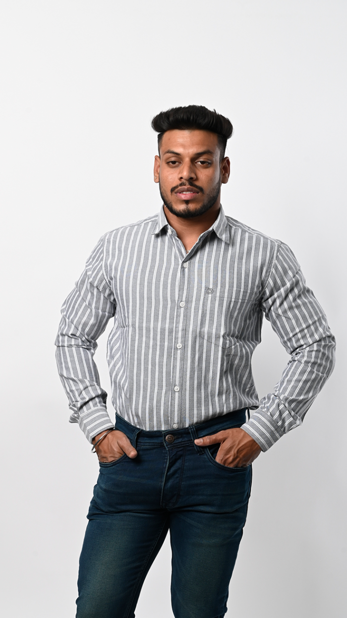 a man with hands in pockets